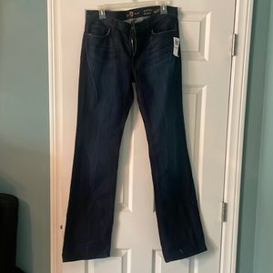 Seven for all mankind. Mid rise bootcut jeans